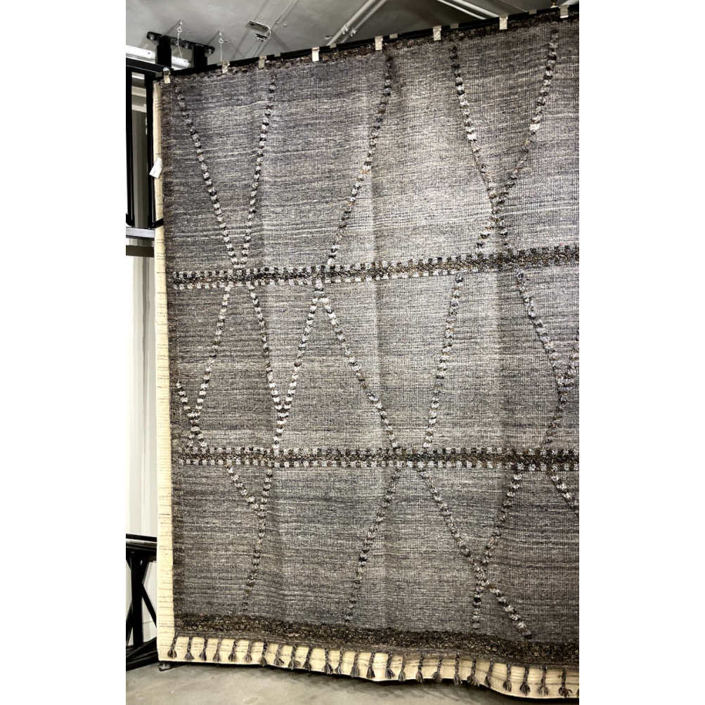 Featuring Iman Grey/Multi Hand-Knotted Rug by Loloi at Amethyst Home. A new take on Moroccan style rugs, the Iman Collection is hand-knotted of 100% wool pile by skilled artisans in India. The surface features linear and braided details, creating tonal variations that make each piece unique. Plus, each design is finished with playful fringe.
Hand Knott.  Amethyst Home provides interior design, new home construction design consulting, vintage area rugs, and lighting in the Winter Garden metro area.