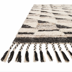 Featuring Khalid Natural/Black Hand-Knotted Rug by Loloi at Amethyst Home. A nod to timeless Moroccan style, the Khalid Collection is hand-knotted in India by skilled artisans. The soft pile features 100% natural, undyed wool, lending slight variations in tones that make each piece it's own. Plus, each rug is finished with a thoughtfully designed fringe.
H.  Amethyst Home provides interior design, new home construction design consulting, vintage area rugs, and lighting in the San Diego metro area.