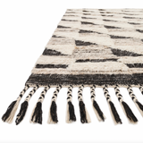 Featuring Khalid Natural/Black Hand-Knotted Rug by Loloi at Amethyst Home. A nod to timeless Moroccan style, the Khalid Collection is hand-knotted in India by skilled artisans. The soft pile features 100% natural, undyed wool, lending slight variations in tones that make each piece it's own. Plus, each rug is finished with a thoughtfully designed fringe.
H.  Amethyst Home provides interior design, new home construction design consulting, vintage area rugs, and lighting in the San Diego metro area.