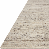 Featuring Rayan Silver Rug by Loloi at Amethyst Home. Hand-woven of 100% wool in India, the Rayan Silver Area Rug sets the tone for a calming atmosphere. Each design is crafted of textural highs and lows paired with neutral tones to create and engaging understatement. The perfect rug for your bedroom, office, or other medium traffic area. 
Hand Woven93% Wool.  Amethyst Home provides interior design, new home construction design consulting, vintage area rugs, and lighting in the Seattle metro area.