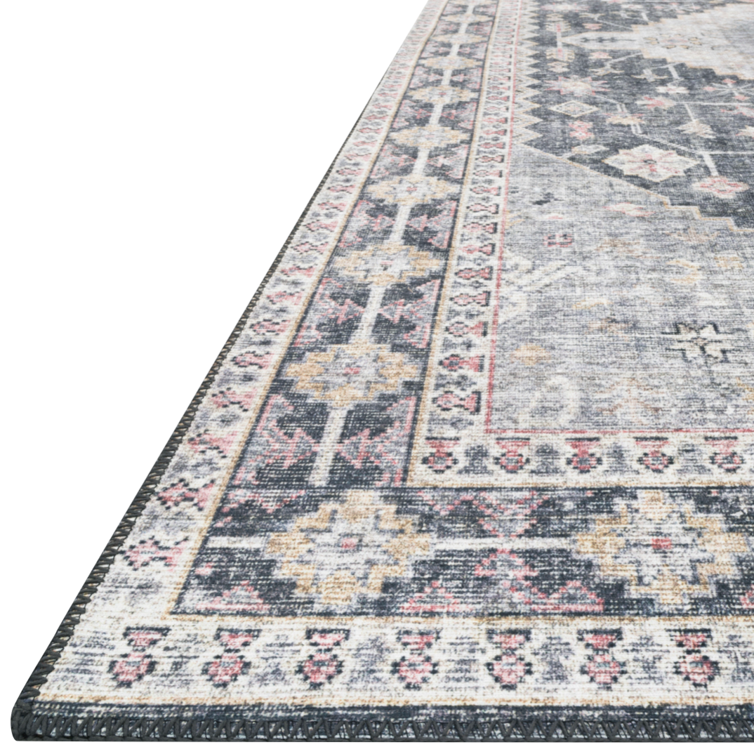 Featuring Skye Charcoal/Multi Rug by Loloi at Amethyst Home. The Skye Charcoal/Multi area rug from Loloi captures the spirit of a one-of-a-kind vintage or antique area rug. You will love this rug because the rug is: 
Perfect for families with kids and pets
Very easy to clean and maintain
Comes in big area rug sizes and as cute kitchen and hallway runn.  Amethyst Home provides interior design, new home construction design consulting, vintage area rugs, and lighting in the Winter Garden metro area.