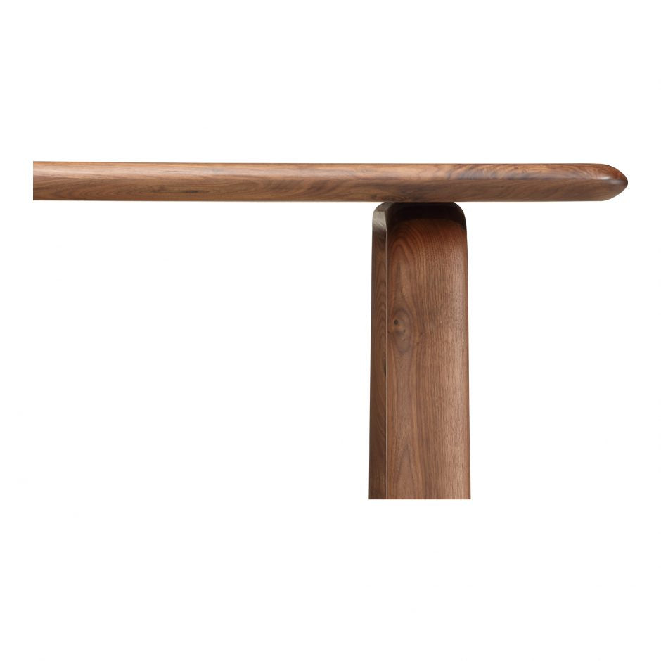 The Malibu dining table embodies an organic aesthetic through its design. Thick pieces of solid walnut is used from head to toe, showing off this pieces beautiful grain pattern and shades. The rounded edges on the legs and table-top creates a flow that is more contemporary and natural. With seating space for 10, the Malibu dining table can host the entire neighborhood.   Dimensions: 88"W x 38"D x 30"H  Materials: Solid Walnut