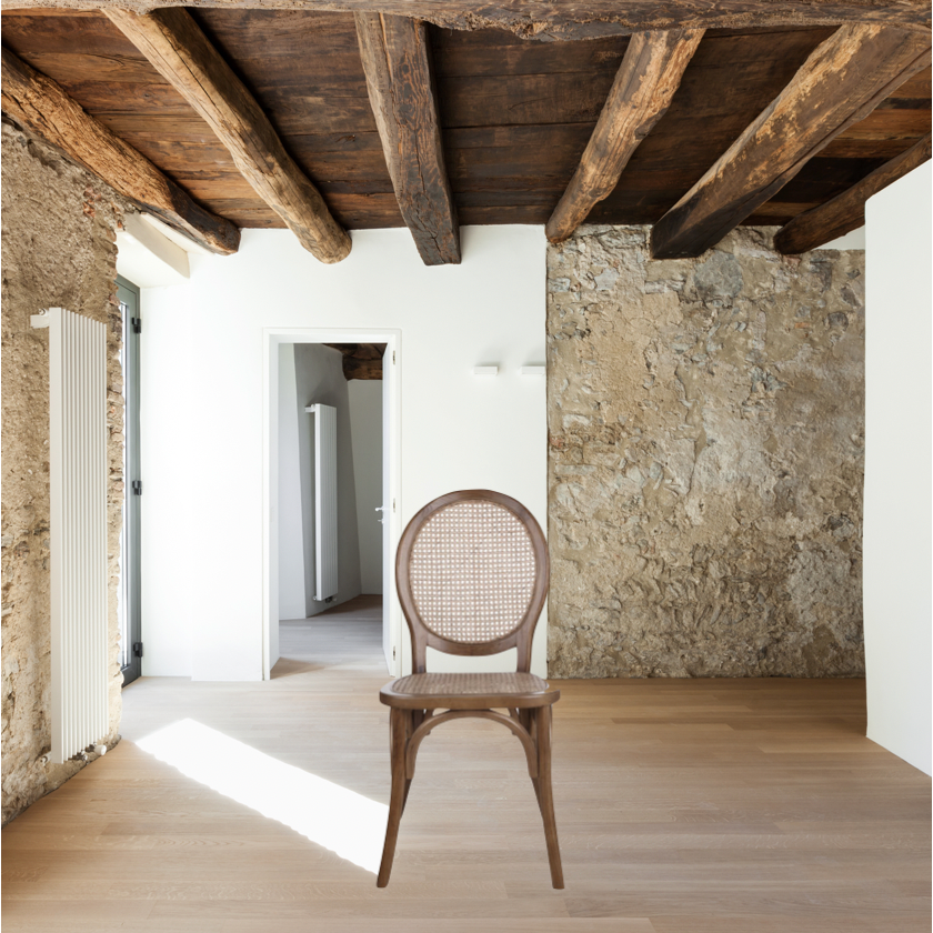 With its classy yet laid back look, the brown Rivalto Dining Chair is designed for a bohemian or mid-century modern home. Its organic design is made from genuine rattan and solid elm wood for a lifelong construction.  Size: 17.7"W x 16.5"D x 37"H"