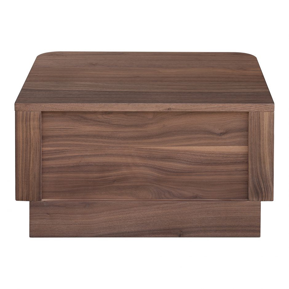 We love the soft, rounded edges of this Round Off Nightstand - Walnut. With a pull out drawer, this is both a functional and beautiful piece to add to any bedroom or guest room!   Size: 20 x 15"D x 11"H Material: Walnut Veneer, MDF, Rubberwood Base