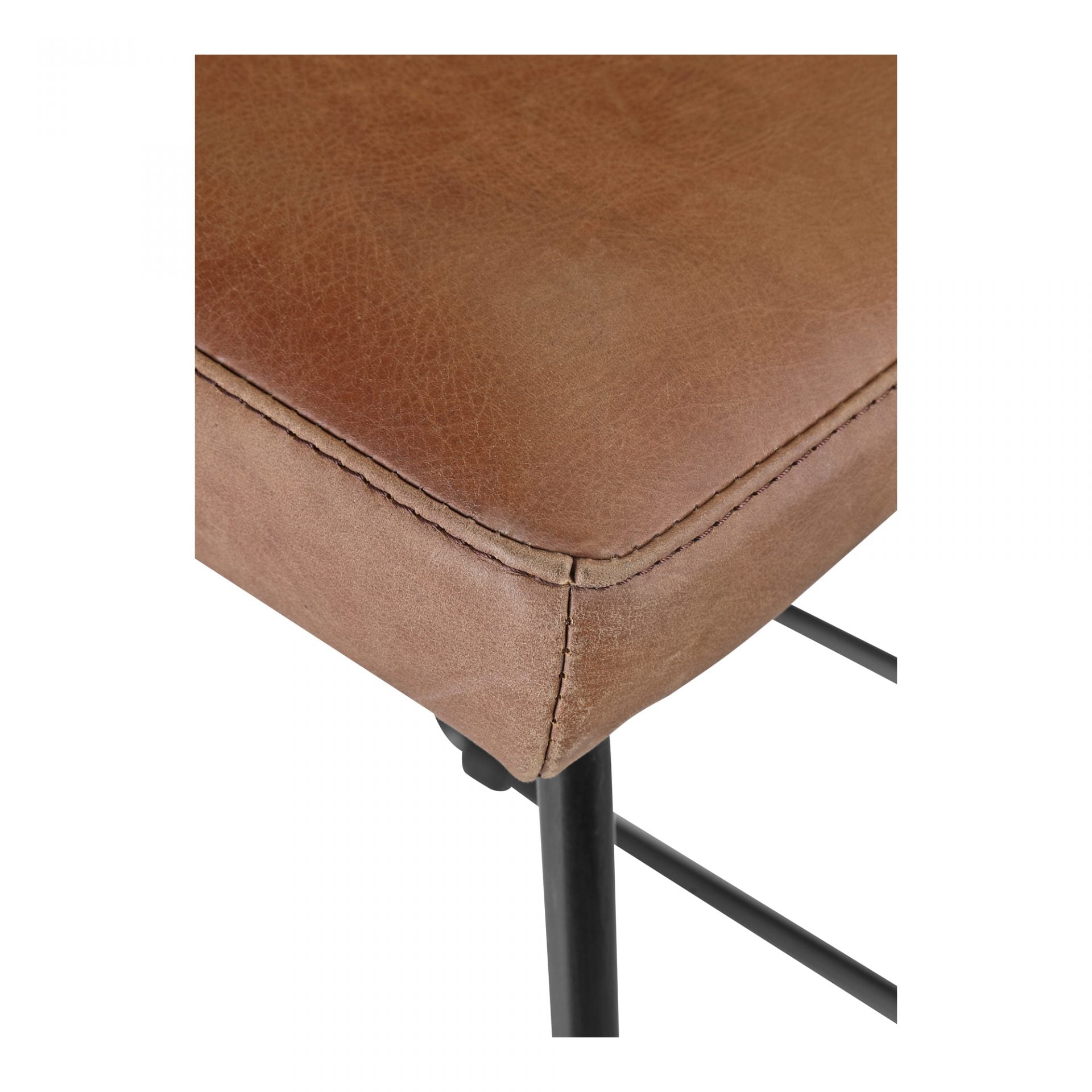 Upgrade your kitchen or dining room with this sleek, cocktail-ready Starlet Counter + Bar Stool - Open Road Brown Leather that showcases poise and comfort. This adds a cool sophistication to your space with its slim iron frame and luxe leather upholstery.