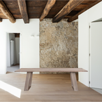 The airy base of this Tanya Dining Table brings a modern look to a classic dining table. Made of Acacia wood with a whitewash finish and sitting up to 8 people, this is a great piece for families wanting to add natural elements to their dining room  Size: 98"W x 40"D x 30"H Materials: Solid Acacia