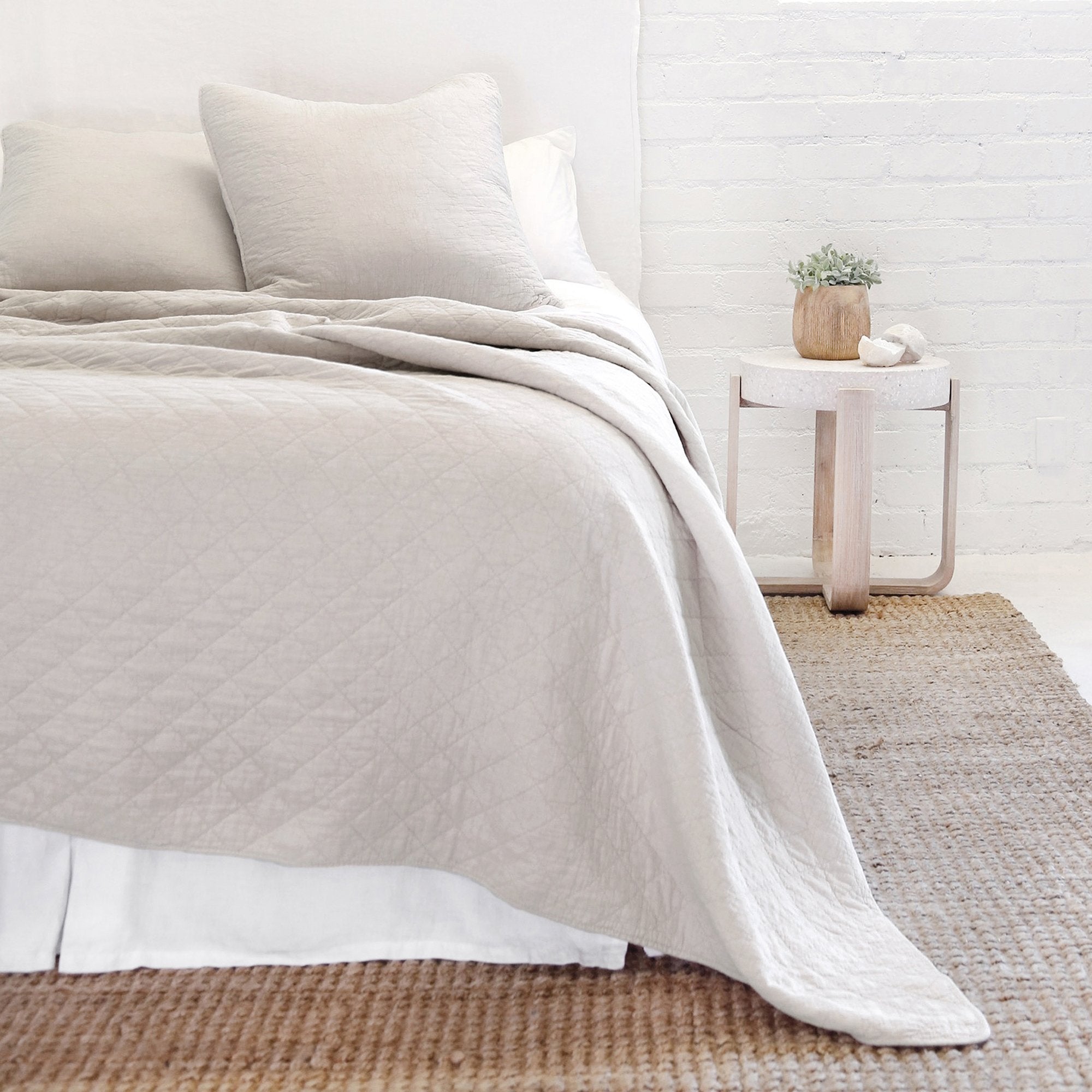 This versatile collection is made of 100% stone washed cotton that offers year-round comfort and luxury. The Huntington Coverlet Bedding Taupe by Pom Pom at Home features a diamond quilted pattern and 1/2" piping along the edges. 100% Cotton Machine wash cold; tumble dry low; warm iron as needed. Do not bleach