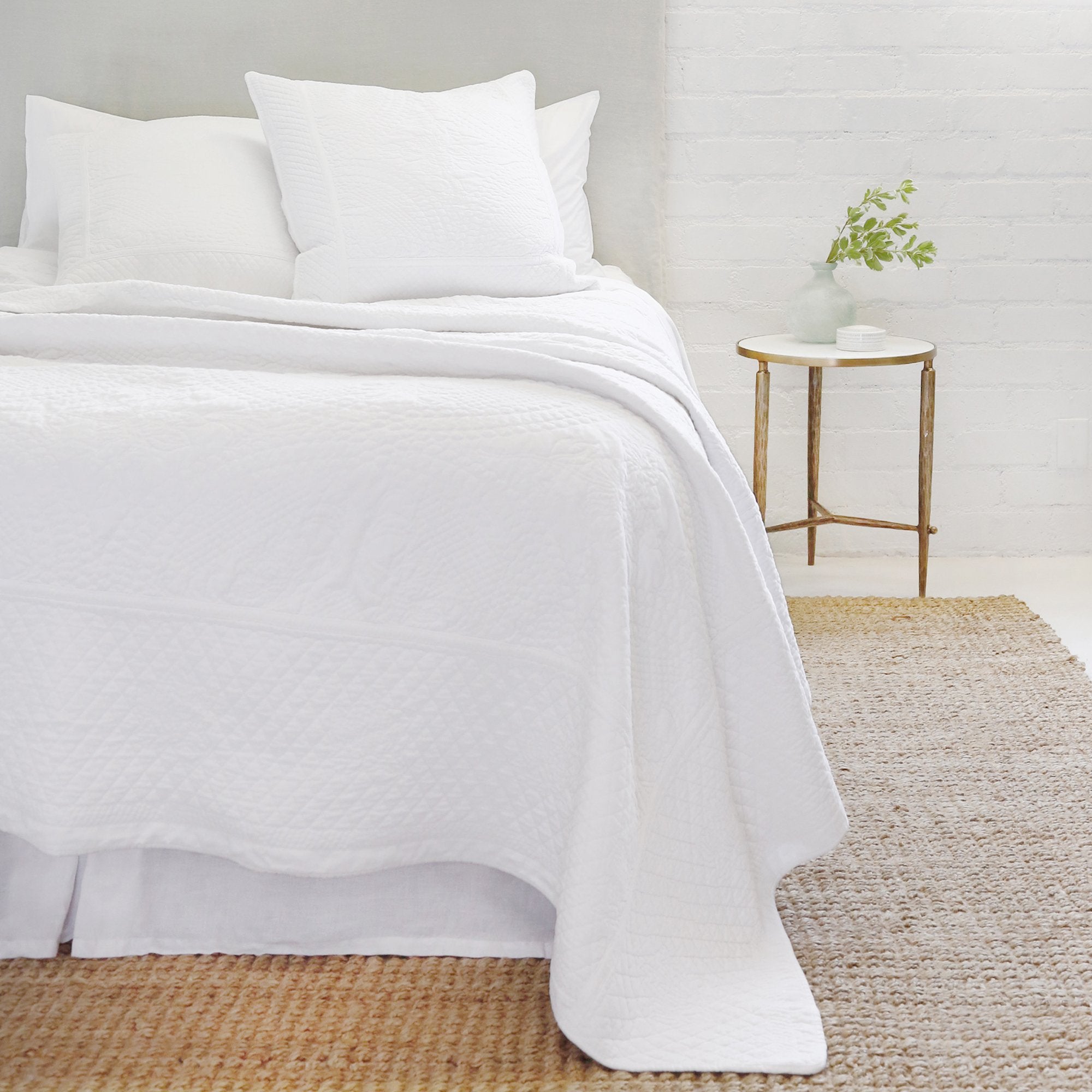 The Marseille Coverlet Bedding White by Pom Pom is luxurious and elegant with a detailed floral and diamond quilted pattern on the front made of 100% stone washed cotton velvet. 100% cotton velvet Machine wash cold; tumble dry low; warm iron as needed Do not bleach