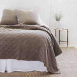The Brussels Coverlet Bedding Walnut by Pom Pom at Home is a grand and sophisticated line that has a diamond quilted pattern on the front, made of 100% stone washed cotton velvet. Available in several soft, stone washed colors.  100% cotton velvet Machine wash cold; tumble dry low; warm iron as needed Do not bleach