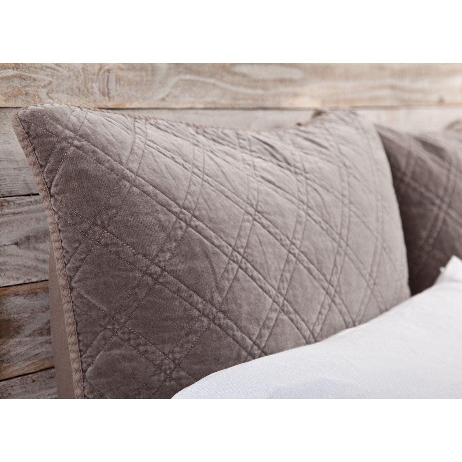 The Brussels Coverlet Bedding Walnut by Pom Pom at Home is a grand and sophisticated line that has a diamond quilted pattern on the front, made of 100% stone washed cotton velvet. Available in several soft, stone washed colors. 100% cotton velvet Machine wash cold; tumble dry low; warm iron as needed Do not bleach