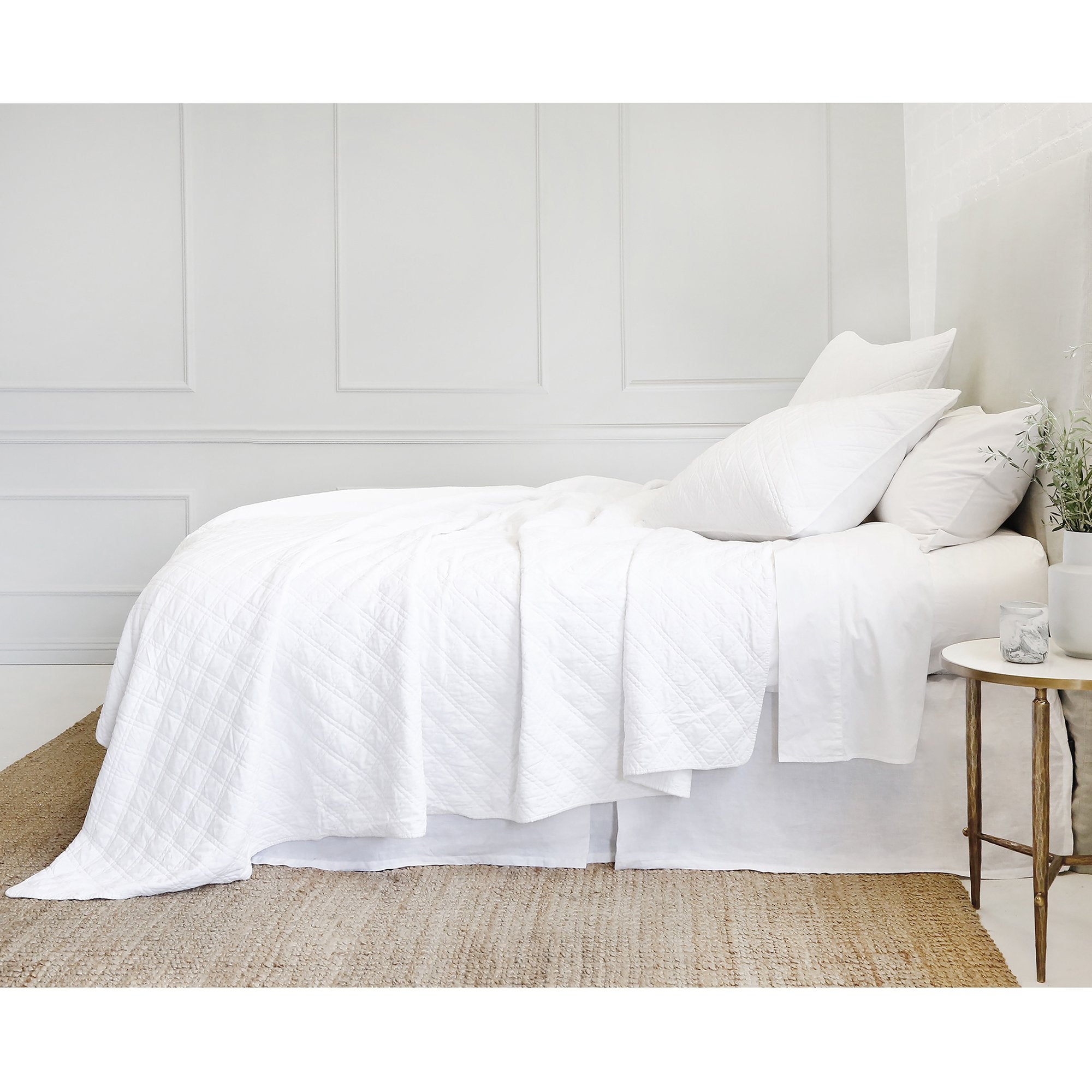 The Brussels Coverlet Bedding White by Pom Pom at Home is a grand and sophisticated line that has a diamond quilted pattern on the front, made of 100% stone washed cotton velvet. Available in several soft, stone washed colors. 100% cotton velvet Machine wash cold; tumble dry low; warm iron as needed Do not bleach