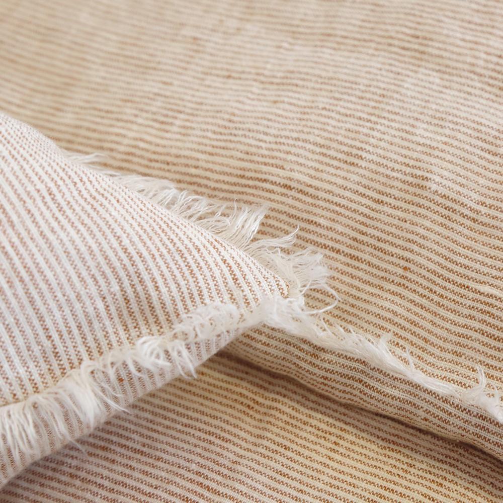 Subtle frayed edges of soft linen add a dash of unexpected detail to this Logan Duvet Collection Terra Cotta by Pom Pom at Home. Woven with two different colored yarns for a heathered effect, the duvet cover and shams feature shell button closures. Inserts sold separately 100% linen Shell-button closure Machine wash cold; tumble dry low; warm iron as needed. Do not bleach