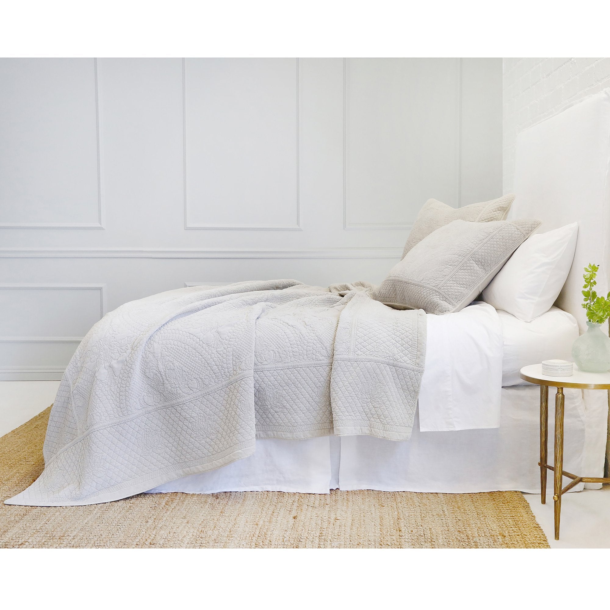 The Marseille Coverlet Bedding Taupe by Pom Pom at Home is luxurious and elegant with a detailed floral and diamond quilted pattern on the front made of 100% stone washed cotton velvet. 100% cotton velvet Machine wash cold; tumble dry low; warm iron as needed Do not bleach