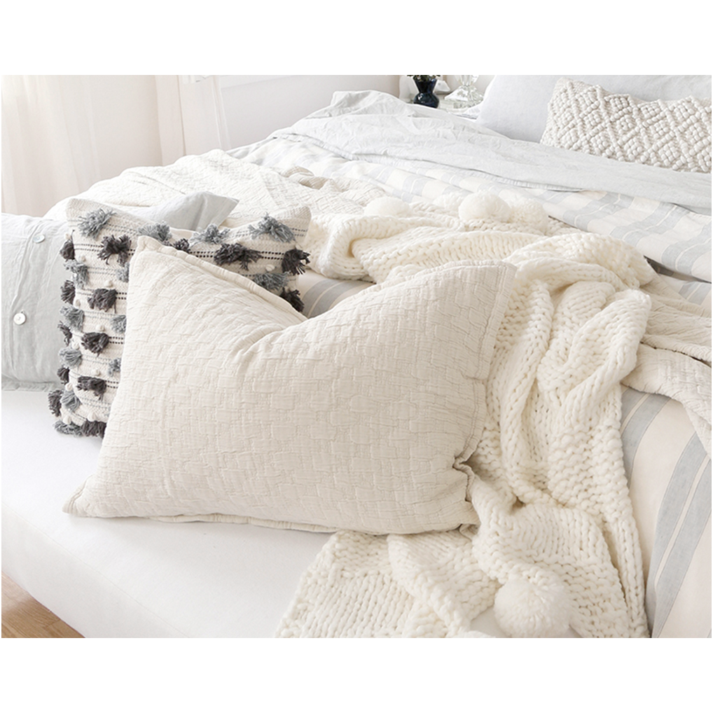 Crafted in Portugal, the Ojai Greige Matelasse Collection by Pom Pom at Home is light and casual, bringing comfort with its subtle diamond pattern. The coziest bedding to climb into after a long day. 100% cotton. Machine wash cold; tumble dry low; warm iron as needed. Do not bleach