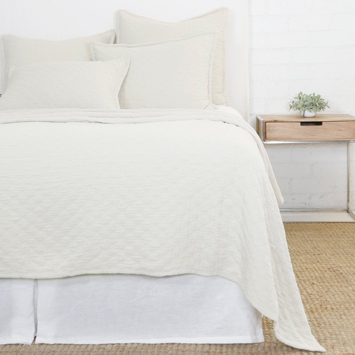 Crafted in Portugal, the Ojai Greige Matelasse Collection by Pom Pom at Home is light and casual, bringing comfort with its subtle diamond pattern. The coziest bedding to climb into after a long day. 100% cotton. Machine wash cold; tumble dry low; warm iron as needed. Do not bleach