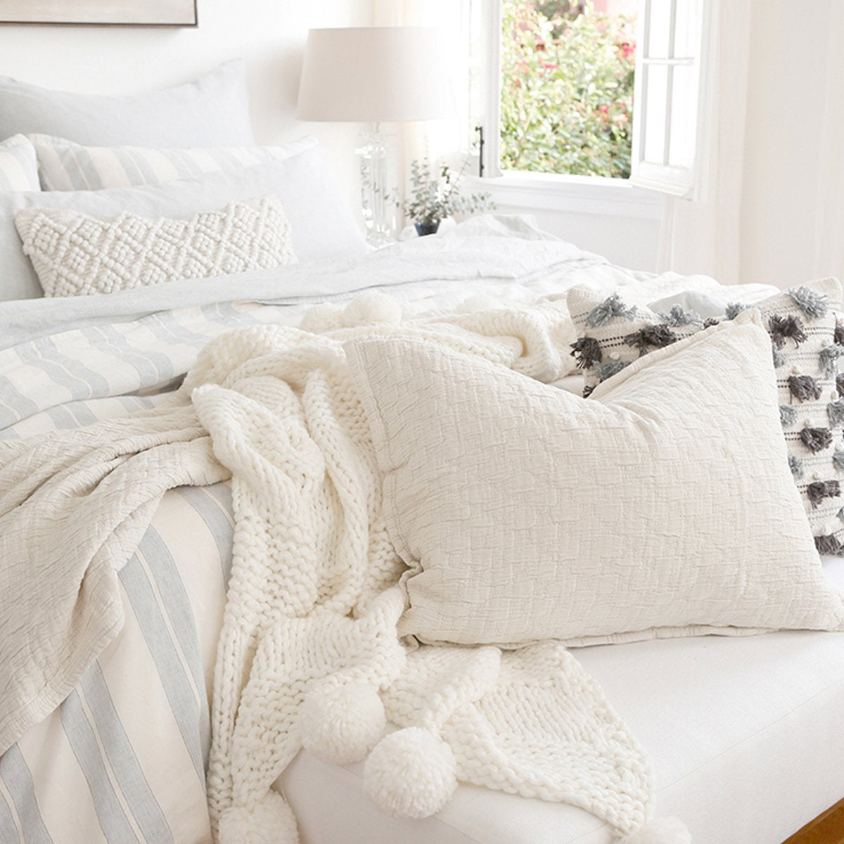 Crafted in Portugal, the Ojai Greige Matelasse Collection by Pom Pom at Home is light and casual, bringing comfort with its subtle diamond pattern. The coziest bedding to climb into after a long day. 100% cotton. Machine wash cold; tumble dry low; warm iron as needed. Do not bleach
