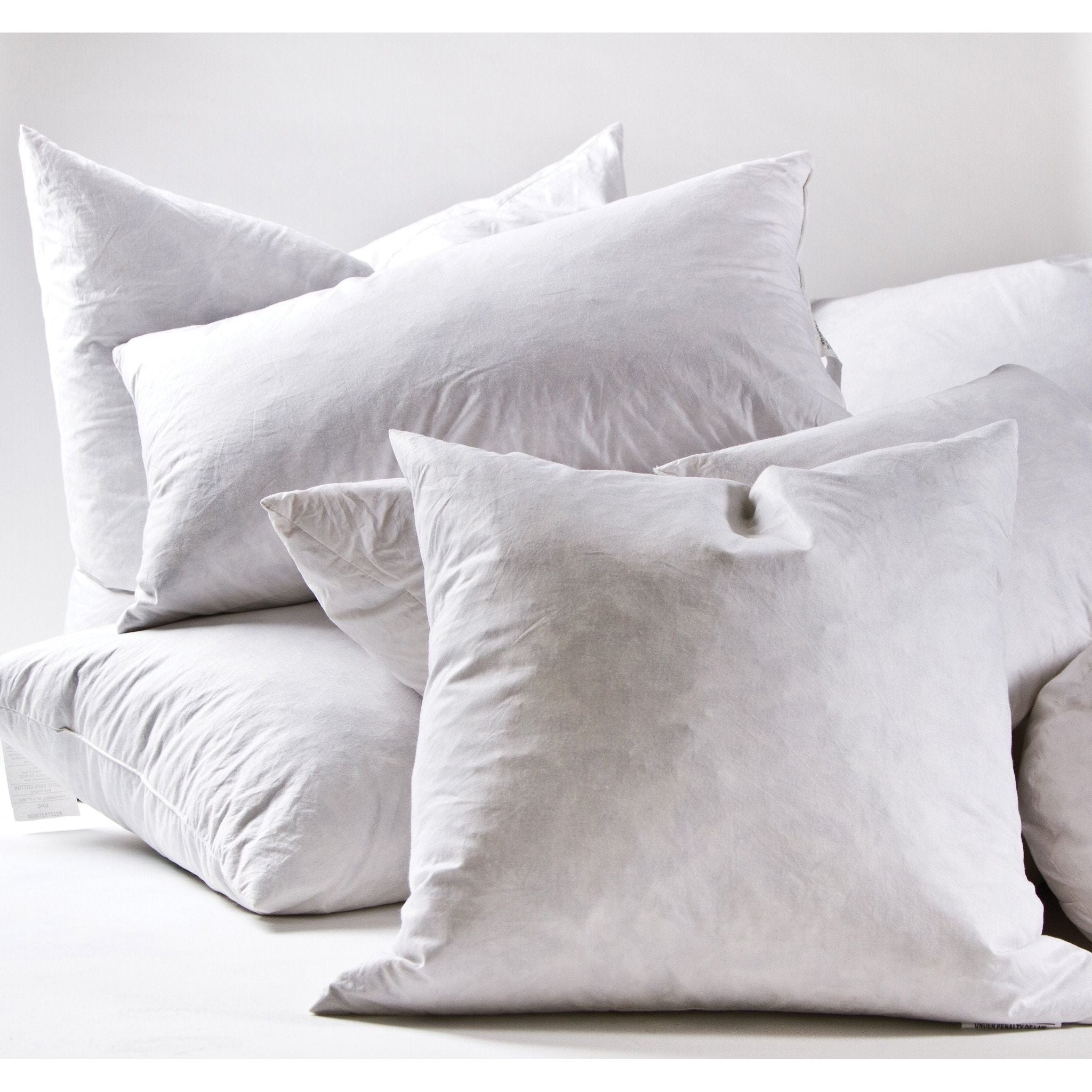 Pair this Pillow Insert by Pom Pom at Home with one of our one-of-a-kind vintage pillow covers or any other pillow needing a comfy insert! Details & Care: 100% White Cotton - Fill: 5% Down - 95% Feather