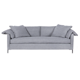 Featuring Radley Upholstered Sofa Family by Cisco Brothers at Amethyst Home. A love letter to the Radley sofa -- the metal iron feet and laid back approach to sitting is effortlessly chic.  A feather cloud cushion with down filled back cushions allow for a sit that is upright yet comfortably deep. Photographed in Molino Fog. Lifestyle Photograph in Gr.  Amethyst Home provides interior design, new home construction design consulting, vintage area rugs, and lighting in the Salt Lake City metro area.