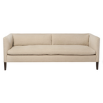 Featuring Stewart Sofa by Cisco Brothers at Amethyst Home. The Stewart Sofa by Cisco Brothers has a simple silhouette with striking angles and trim wooden accent legs. The wide bench cushion provides ample seating space ideal for entertaining. Pop some popcorn and pile on the throw pillows for cozy movie nights with the family. Photographed in Vintage Fla.  Amethyst Home provides interior design, new home construction design consulting, vintage area rugs, and lighting in the Scottsdale metro area.