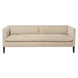 Featuring Stewart Sofa by Cisco Brothers at Amethyst Home. The Stewart Sofa by Cisco Brothers has a simple silhouette with striking angles and trim wooden accent legs. The wide bench cushion provides ample seating space ideal for entertaining. Pop some popcorn and pile on the throw pillows for cozy movie nights with the family. Photographed in Vintage Fla.  Amethyst Home provides interior design, new home construction design consulting, vintage area rugs, and lighting in the Scottsdale metro area.