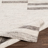 Featuring Tamaris Rug by Surya at Amethyst Home. The Tamaris Collection features compelling global inspired designs brimming with elegance and grace! The perfect addition for any home, these pieces will add eclectic charm to any room! The meticulously woven construction of these pieces boasts durability and will provide natural charm into your decor space.  Amethyst Home provides interior design, new home construction design consulting, vintage area rugs, and lighting in the Scottsdale metro area.