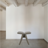 The Butterfly Upholstered Occasional Stool by Verellen is abstract and beautiful. This comes standard with:  soy based poly wrap seat construction double needle stitch detail knife edge upholstery style sits on glides standard walnut brace