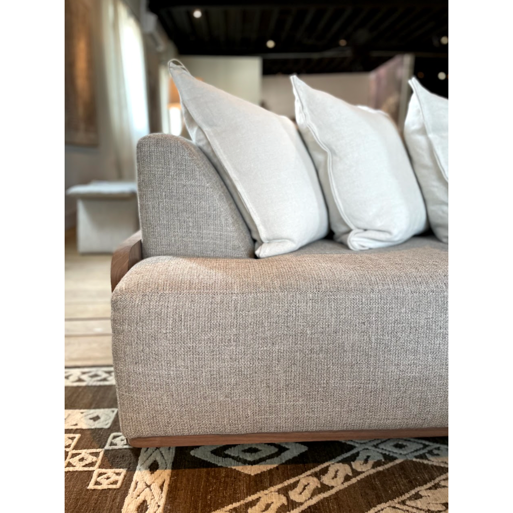 We love the exposed wood on the Rowan Sofa Family by Verellen. A comfortable, lasting sofa to have the family gathered together for years to come! This is made with a sustainably harvested hardwood frame and 8-way hand-tied seat construction.