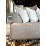 We love the exposed wood on the Rowan Sofa Family by Verellen. A comfortable, lasting sofa to have the family gathered together for years to come! This is made with a sustainably harvested hardwood frame and 8-way hand-tied seat construction.