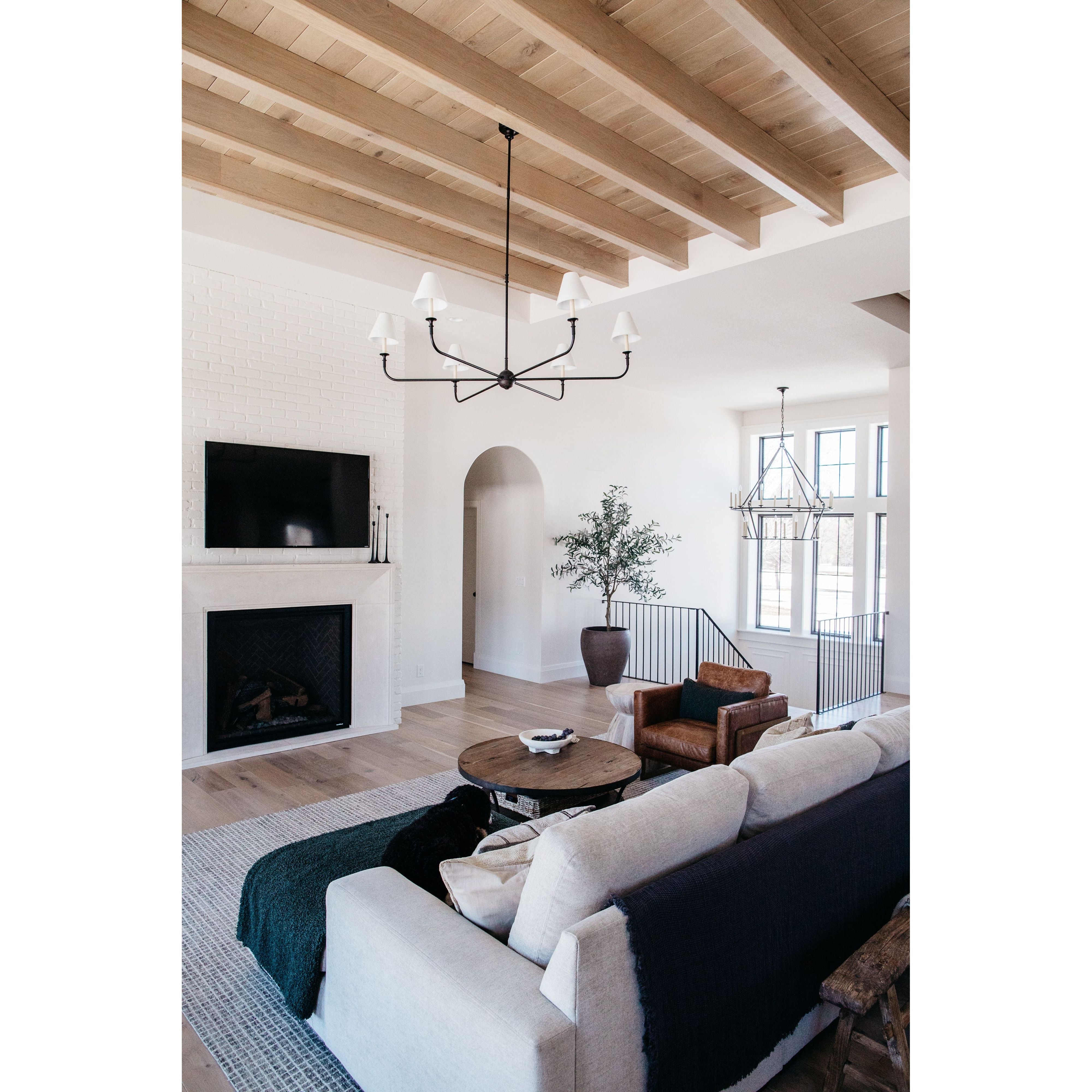 Featuring Piaf Grande Chandelier by Visual Comfort at Amethyst Home. This Piaf Grande Chandelier from Visual Comfort has linen shades and brings a warm, classic look to any entry way, living room, or other large area. 
Overall Dimensions: 58" L x 58" W x 56.75" HWeight: 40 lbs.  Amethyst Home provides interior design, new home construction design consulting, vintage area rugs, and lighting in the Kansas City metro area.