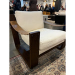 The classic sling chair gets a grand, elevated look. Solid wood frame is shaped, curved and smoothed on all edges. Cushioned seat and back are upholstered in top-grain leather. Amethyst Home provides interior design, new home construction design consulting, vintage area rugs, and lighting in the Charlotte metro area.
