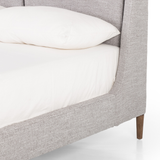Featuring Potter Manor Grey Bed by Four Hands at Amethyst Home. Light, livable luxury. Upholstered in a grey synthetic-blend, a tapered headboard features fixed overscale pillows, for a calming look with great depth. Wire-brushed parawood legs lend a warm, natural finishing touch. Performance fabrics are specially created to withstand spills, stains, hig. Amethyst Home provides interior design, new home construction design consulting, vintage area rugs, and lighting in the Laguna Beach metro area.