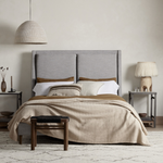 Featuring Potter Manor Grey Bed by Four Hands at Amethyst Home. Light, livable luxury. Upholstered in a grey synthetic-blend, a tapered headboard features fixed overscale pillows, for a calming look with great depth. Wire-brushed parawood legs lend a warm, natural finishing touch. Performance fabrics are specially created to withstand spills, stains, high tr. Amethyst Home provides interior design, new home construction design consulting, vintage area rugs, and lighting in the Monterey metro area.