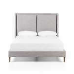 Featuring Potter Manor Grey Bed by Four Hands at Amethyst Home. Light, livable luxury. Upholstered in a grey synthetic-blend, a tapered headboard features fixed overscale pillows, for a calming look with great depth. Wire-brushed parawood legs lend a warm, natural finishing touch. Performance fabrics are specially created to withstand spills, stains, high. Amethyst Home provides interior design, new home construction design consulting, vintage area rugs, and lighting in the Los Angeles metro area.