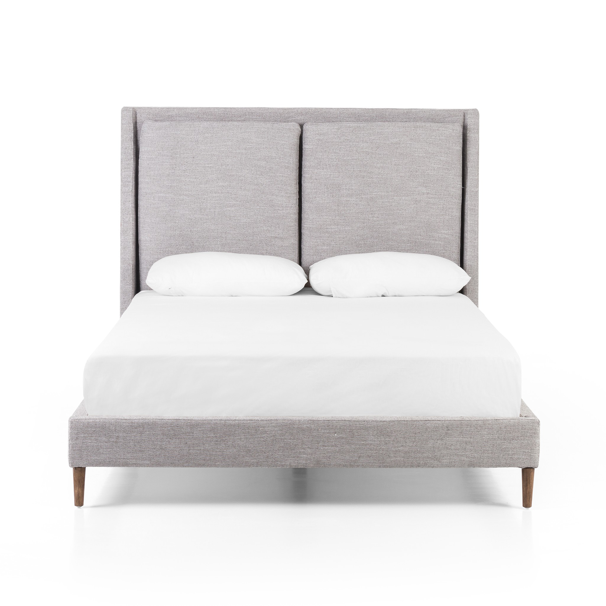 Light, livable luxury. Upholstered in a grey synthetic-blend, a tapered headboard features fixed overscale pillows, for a calming look with great depth. Wire-brushed parawood legs lend a warm, natural finishing touch. Performance fabrics are specially created to withstand spills, stains, high traffic and wear, ensuring long-term comfort and unmatched durability. Amethyst Home provides interior design, new home construction design consulting, vintage area rugs, and lighting in the Los Angeles metro area.
