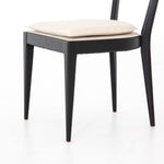 Mixed materials refresh retro dining style. Ebony-finished nettlewood frames a textural inlay of natural cane, for perfect contrast. Fastened by Velcro, high-performance linen-blend seating for modern sensibility. Performance fabrics are specially created to withstand spills, stains, high traffic and wear, ensuring long-term comfort and unmatched durability. Amethyst Home provides interior design, new construction, custom furniture and area rugs in the Atlanta metro area