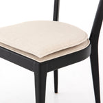 Mixed materials refresh retro dining style. Ebony-finished nettlewood frames a textural inlay of natural cane, for perfect contrast. Fastened by Velcro, high-performance linen-blend seating for modern sensibility. Performance fabrics are specially created to withstand spills, stains, high traffic and wear, ensuring long-term comfort and unmatched durability. Amethyst Home provides interior design, new construction, custom furniture and area rugs in the Nashville metro area