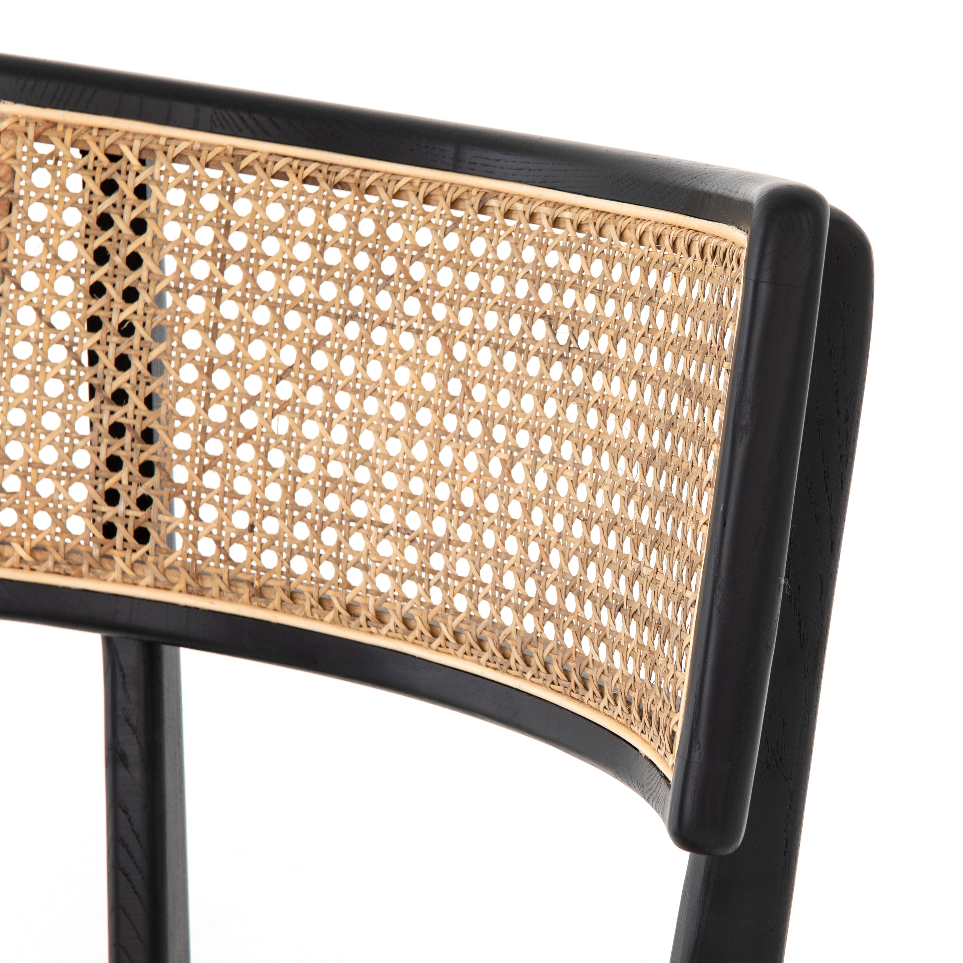 Mixed materials refresh retro dining style. Ebony-finished nettlewood frames a textural inlay of natural cane, for perfect contrast. Fastened by Velcro, high-performance linen-blend seating for modern sensibility. Performance fabrics are specially created to withstand spills, stains, high traffic and wear, ensuring long-term comfort and unmatched durability. Amethyst Home provides interior design, new construction, custom furniture and area rugs in the Memphis metro area