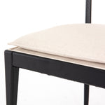 Mixed materials refresh retro dining style. Ebony-finished nettlewood frames a textural inlay of natural cane, for perfect contrast. Fastened by Velcro, high-performance linen-blend seating for modern sensibility. Performance fabrics are specially created to withstand spills, stains, high traffic and wear, ensuring long-term comfort and unmatched durability. Amethyst Home provides interior design, new construction, custom furniture and area rugs in the Chicago metro area