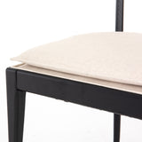 Mixed materials refresh retro dining style. Ebony-finished nettlewood frames a textural inlay of natural cane, for perfect contrast. Fastened by Velcro, high-performance linen-blend seating for modern sensibility. Performance fabrics are specially created to withstand spills, stains, high traffic and wear, ensuring long-term comfort and unmatched durability. Amethyst Home provides interior design, new construction, custom furniture and area rugs in the Chicago metro area