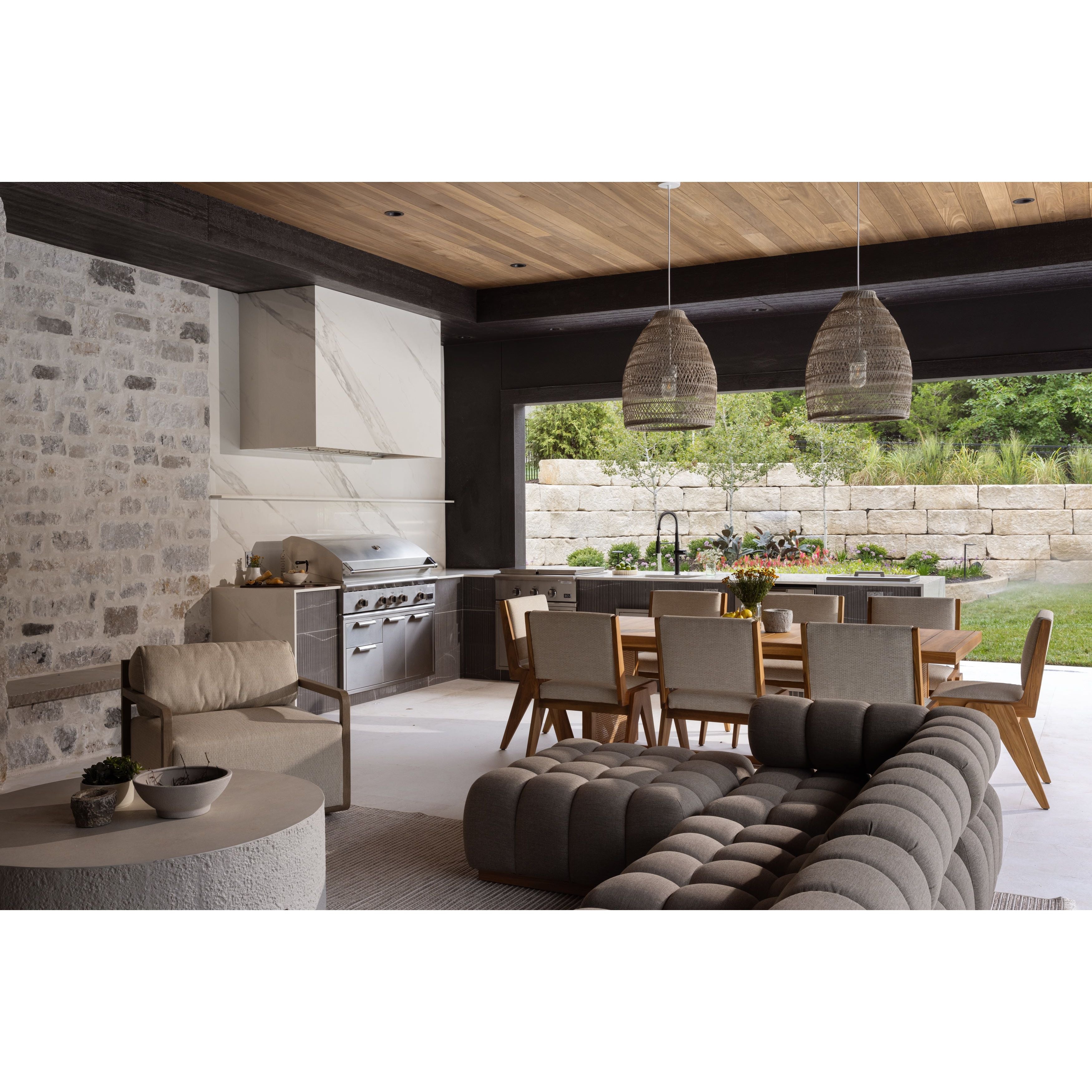 A modern take on mid-century Italian design, soft volume and exaggerated proportions fuse for a sculpted look and playful feel. Atop a plinth-style teak base, outdoor-friendly ottoman features dramatic tufting for a padded sit or a tray for use as a table, indoors and out. Ottoman to matching sectional. Amethyst Home provides interior design, new home construction design consulting, vintage area rugs, and lighting in the Calabasas metro area.