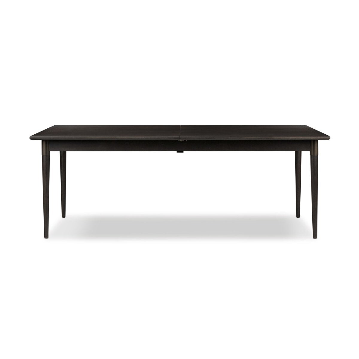 Featuring Harper Black Mango Extension Dining Table by Four Hands at Amethyst Home. Style with flexibility. Finished in a classic black, a rectangular tabletop of mango veneer, solid mango legs and iron detailing speak to Scandinavian modernism. Expansion from 84" to 104" means more space when company calls.
Size: 84"w x 38"d x 30"h. Amethyst Home provides interior design, new home construction design consulting, vintage area rugs, and lighting in the Calabasas metro area.