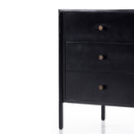 Bring a clean, beautifully industrial look to the bedroom with a three-drawer dresser made from black-finished iron, featuring bronzed iron hardware.