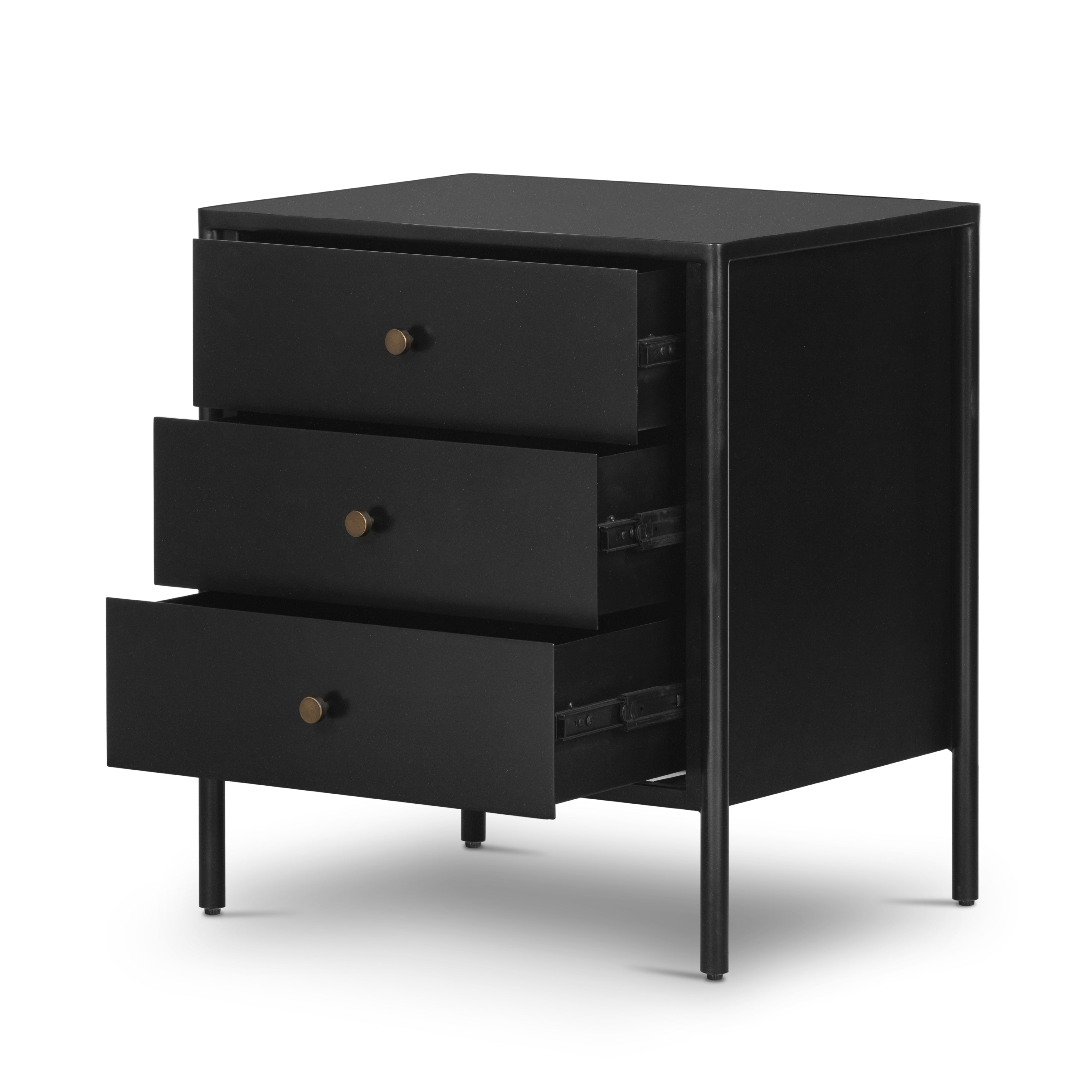 Bring a clean, beautifully industrial look to the bedroom with a three-drawer dresser made from black-finished iron, featuring bronzed iron hardware.