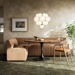 The armless dining bench is elevated with tan top-grain leather with a beautifully pronounced grain, plus dramatic channeling for a linear look. Perfectly sized for larger tables or spaces.Overall Dimensions:49" Bench: 49.00"w x 28.00"d x 31.50"hChair: 25.00"w x 28.00"d x 31.50"hCorner Chair: 28.00"w x 28.00"d x 31.50"hChair + A Half: 38.50"w x 28.00"d x 31. Amethyst Home provides interior design, new home construction design consulting, vintage area rugs, and lighting in the Washington metro area.