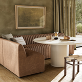The armless dining bench is elevated with tan top-grain leather with a beautifully pronounced grain, plus dramatic channeling for a linear look. Perfectly sized for larger tables or spaces.Overall Dimensions:49" Bench: 49.00"w x 28.00"d x 31.50"hChair: 25.00"w x 28.00"d x 31.50"hCorner Chair: 28.00"w x 28.00"d x 31.50"hChair + A Half: 38.50"w x 28.00"d x 31. Amethyst Home provides interior design, new home construction design consulting, vintage area rugs, and lighting in the Tampa metro area.