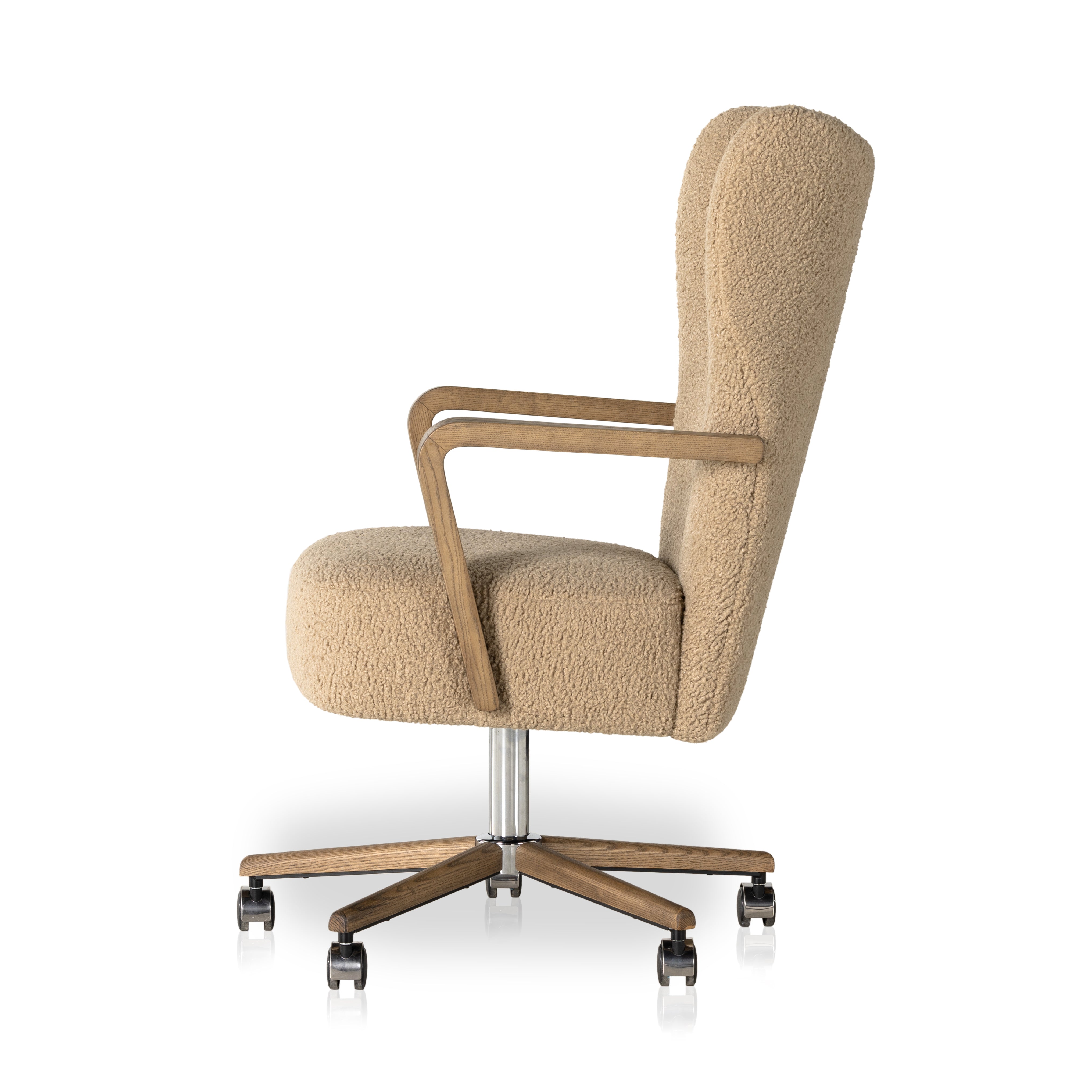 Featuring Melrose Sheepskin Camel Desk Chair by Four Hands at Amethyst Home. A comfort-driven desk chair features soft, textural upholstery in a versatile camel, framed by solid ash arms. A height-adjustable swivel base with casters makes for ease in the modern office.Overall Dimensions: 24.50"W x 27.25"L x 40"HColors: Amber Ash, Polished Aluminum, Sheepskin C. Amethyst Home provides interior design, new home construction design consulting, vintage area rugs, and lighting in the Austin metro area.