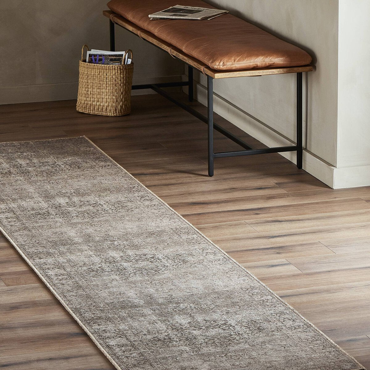 Featuring Morelli Alani Natural Rug by Four Hands at Amethyst Home. A jute-blend area rug is power-loomed in Egypt. Each pattern is created from a high-quality scan of a vintage rug. A team of graphic designers then perfects the pattern and colors to closely resemble the original rug. The result: a textural and versatile piece that looks authentically antiqued. Amethyst Home provides interior design, new home construction design consulting, vintage area rugs, and lighting in the Dallas metro area.