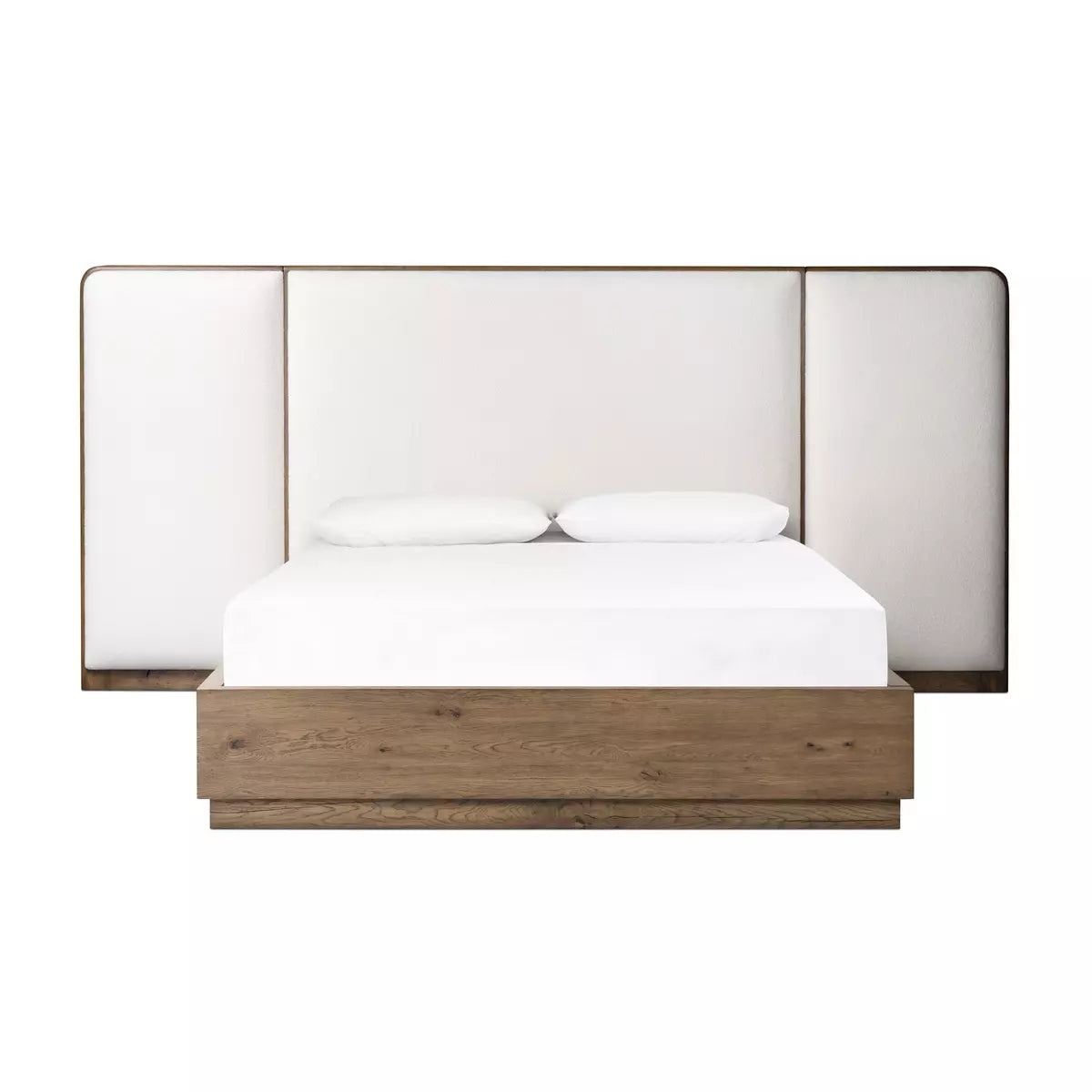 A plush, winged headboard adds dramatic scale and inviting comfort to this modern bed. Thick rails and a footboard with a plinth base have a rustic finish. Amethyst Home provides interior design, new home construction design consulting, vintage area rugs, and lighting in the Scottsdale metro area.