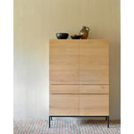 Featuring Ligna Black Oak Cupboard by Ethnicraft at Amethyst Home. A clean and pure look with black metal legs, the Ligna storage cupboard offers a perfect storage facility for the kitchen, living room or dining room.Weight : 293 lbs Dimensions: 20" W x 43.5" L x 64" H.  Amethyst Home provides interior design, new home construction design consulting, vintage area rugs, and lighting in the Charlotte metro area.