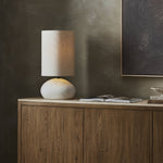 Featuring Allura White Speckled Ceramic Table Lamp by Four Hands at Amethyst Home. A curved ceramic base with a speckled matte finish supports an extra-tall flax linen shade. This elongated silhouette brings a sculptural look to any tabletop.Overall Dimensions: 12.00"w x 11.00"d x 23.00"hWeight : 6.44 lbsMaterials : Ceramic, Thermoplastic, 65% Polyester, 35% Flax/Linen. Amethyst Home provides interior design, new construction, custom furniture, and area rugs in the Salt Lake City metro area